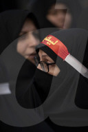 Veiled Iranian Women Participate In A Funeral For Unknown Martyrs