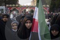 Veiled Iranian Women Participate In A Funeral For Unknown Martyrs