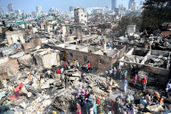  	Devastation And Resilience In The Wake Of The Korail Slum Fire In Dhaka 