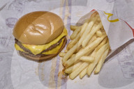 McDonald’s Cheeseburger And Fries Served In Bari Restaurant