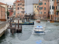 Polizia Water Boat Speeds Through Canal In Venice