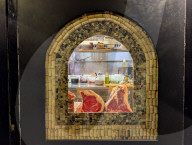 Large Raw Meat Cuts Displayed In Florentine Eatery Window