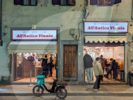 Deliveroo Courier Waits At Florentine Sandwich Shop