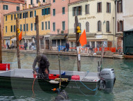 Diver Conduct Construction Work In Cannaregio Canal In Venice