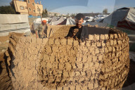 Displaced Palestinian Potters Build a Mud Workshop in Al-Zawaida, Central Gaza Strip