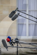 IIlustration - Microphones During a Presser