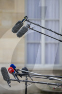 IIlustration - Microphones During a Presser