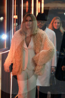 PEOPLE - Michelle Hunziker and daughter Aurora Ramazzotti head to a festive Christmas party in Milan