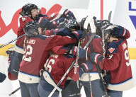 THE CANADIAN PRESS 2026-01-04