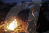 Gazans in tents resort to rubble fires for warmth
