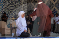 Three Couples Who Violated Sharia Law Caned in Indonesia